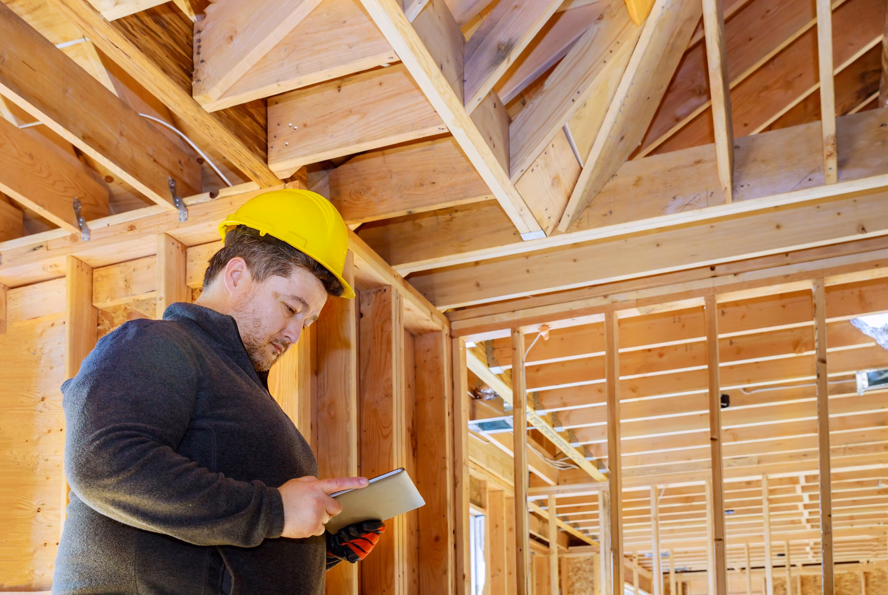 Construction manager inspecting a multi-residential project