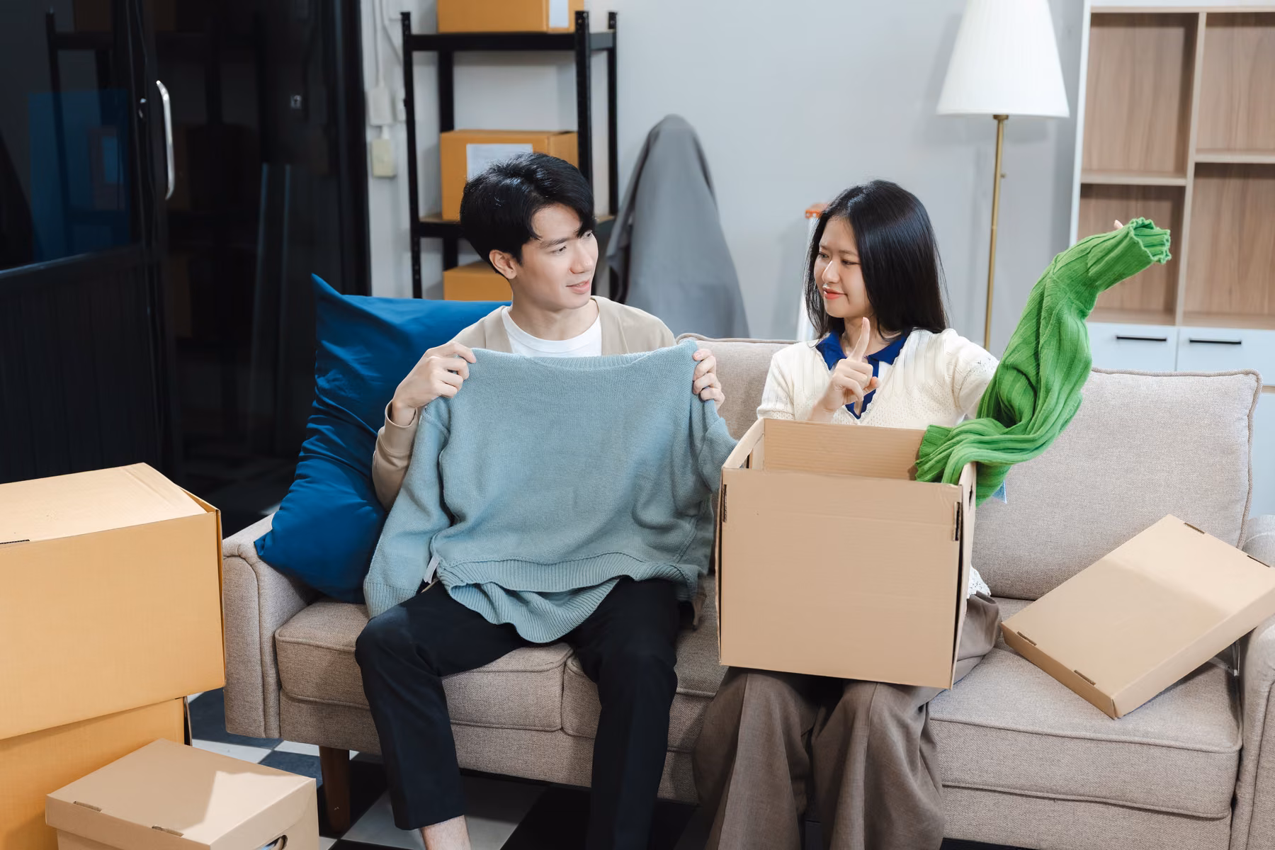 Homebuyers unpacking in a new townhouse
